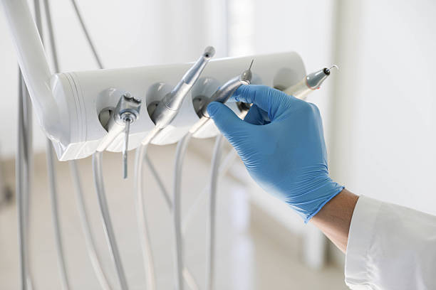 Professional Tooth Extraction technician working in Cramerton, NC